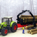 Claas Axion 850 mit Holzanhänger