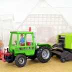 Deutz Intrac 2003 von Hausser mit Claas Rollant 340 Presse von Siku